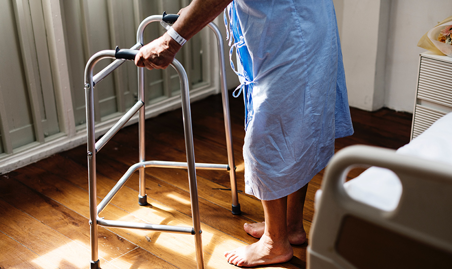 Elderly person with walker